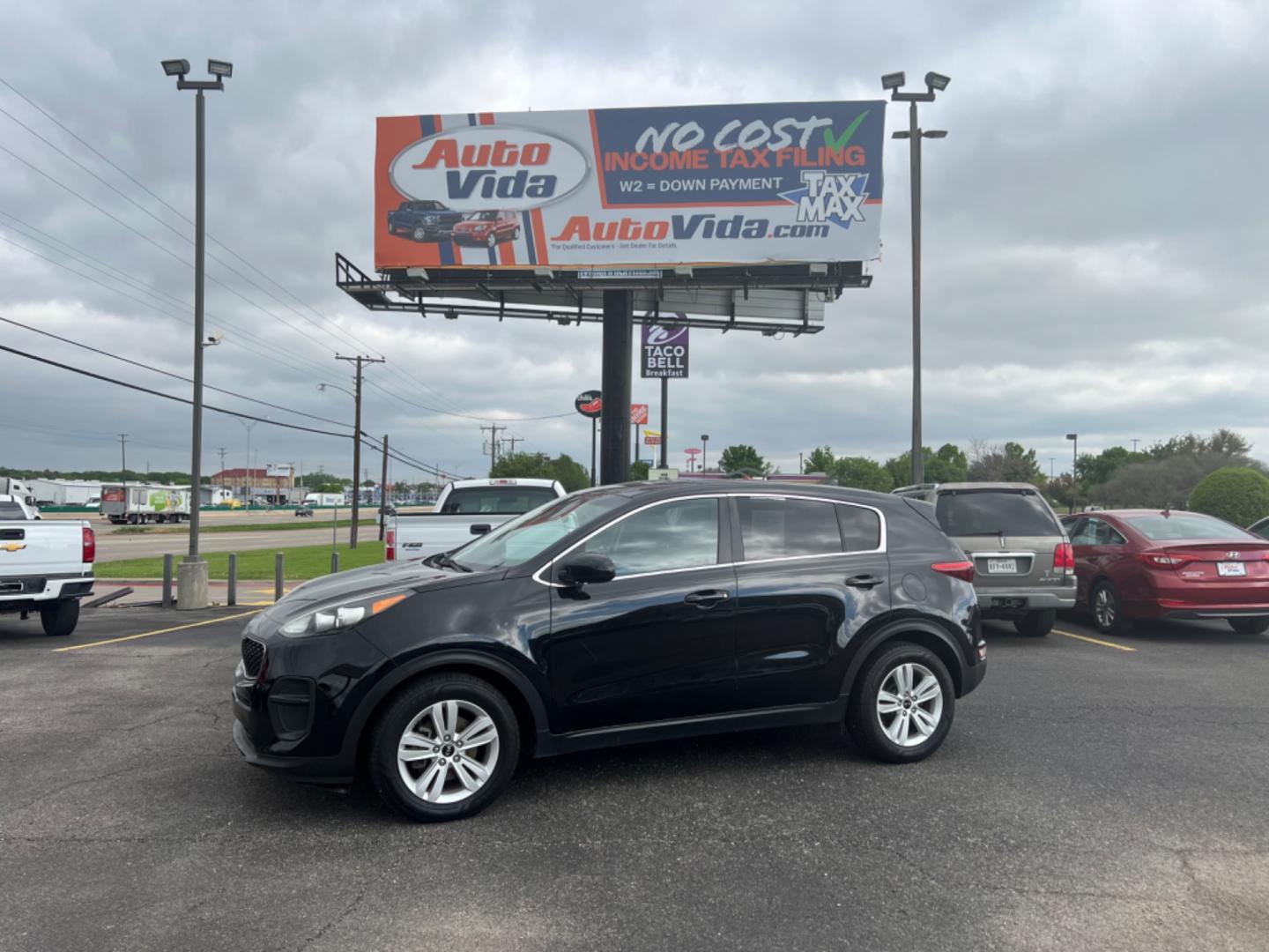 2017 BLACK Kia Sportage LX FWD (KNDPM3AC2H7) with an 2.4L V6 DOHC 24V engine, 6A transmission, located at 420 I-35E, Lancaster, TX, 75146, (469) 297-4144, 32.593929, -96.823685 - Photo#0